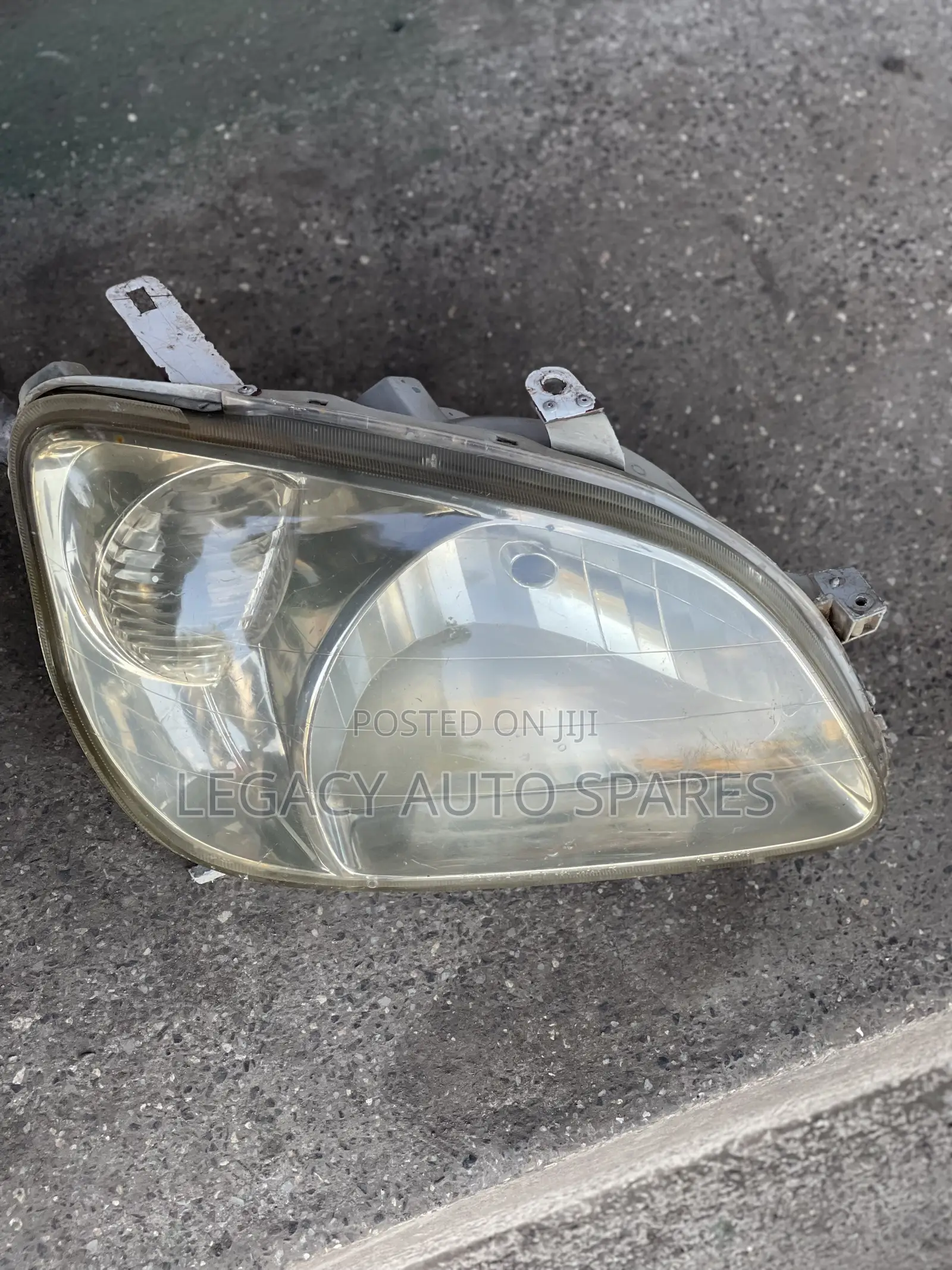 Toyota Raum Headlight