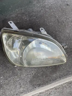 Toyota Raum Headlight