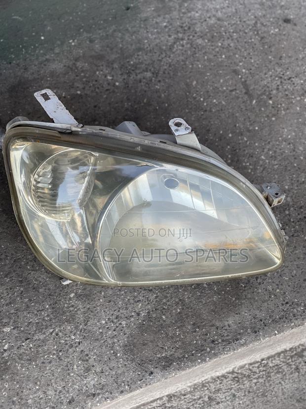 Toyota Raum Headlight
