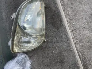Toyota Raum Headlight