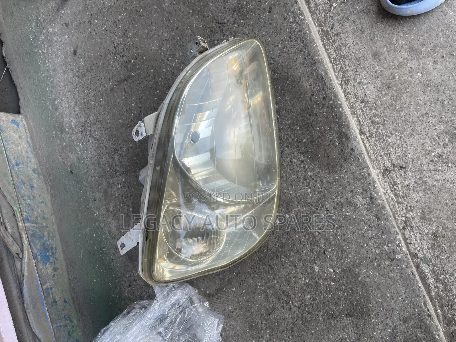 Toyota Raum Headlight