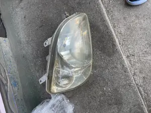 Toyota Raum Headlight