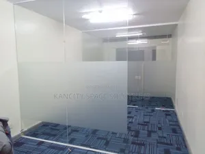 Installation of Tile Carpet and Glass Partitions/Wall