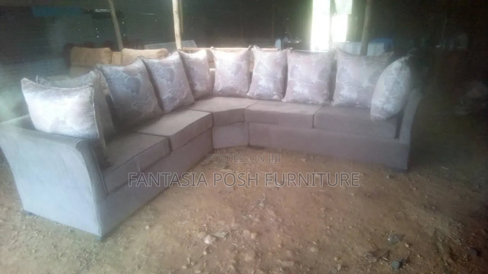 L-Shaped Fabric Sofa With Patterned Cushions