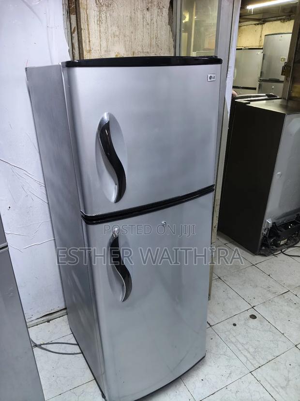 Neat Lg Fridge With a Curved Handles - main view