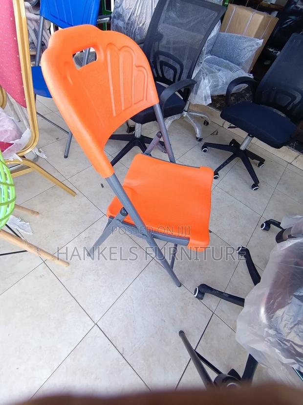 Orange Foldable Plastic Chair - thumbnail 2
