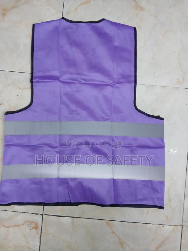 Back Side Of A Purple Reflector Vest