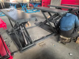 Commercial Scissor Lift Machine 4tonne Lifting Capacity.