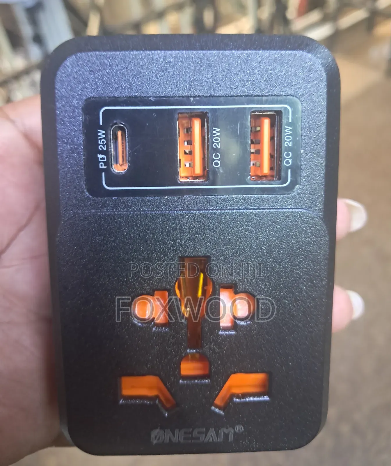 Onesam Os-U70 4-in-1 Universal Travel Adapter and Charger.