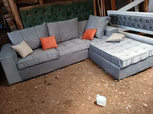 Grey L-Shaped Tufted Sofa With Pillows - Free Delivery