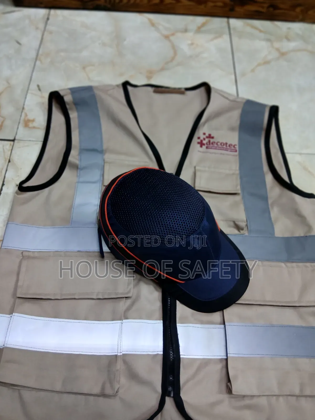 A Bump Cap And A Jacket In Beige