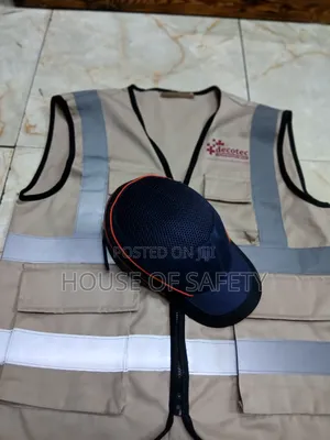 A Bump Cap And A Jacket In Beige