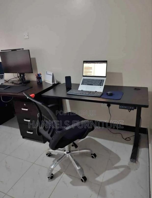 Electric Sit–Stand Desk With Strong Metal Frame