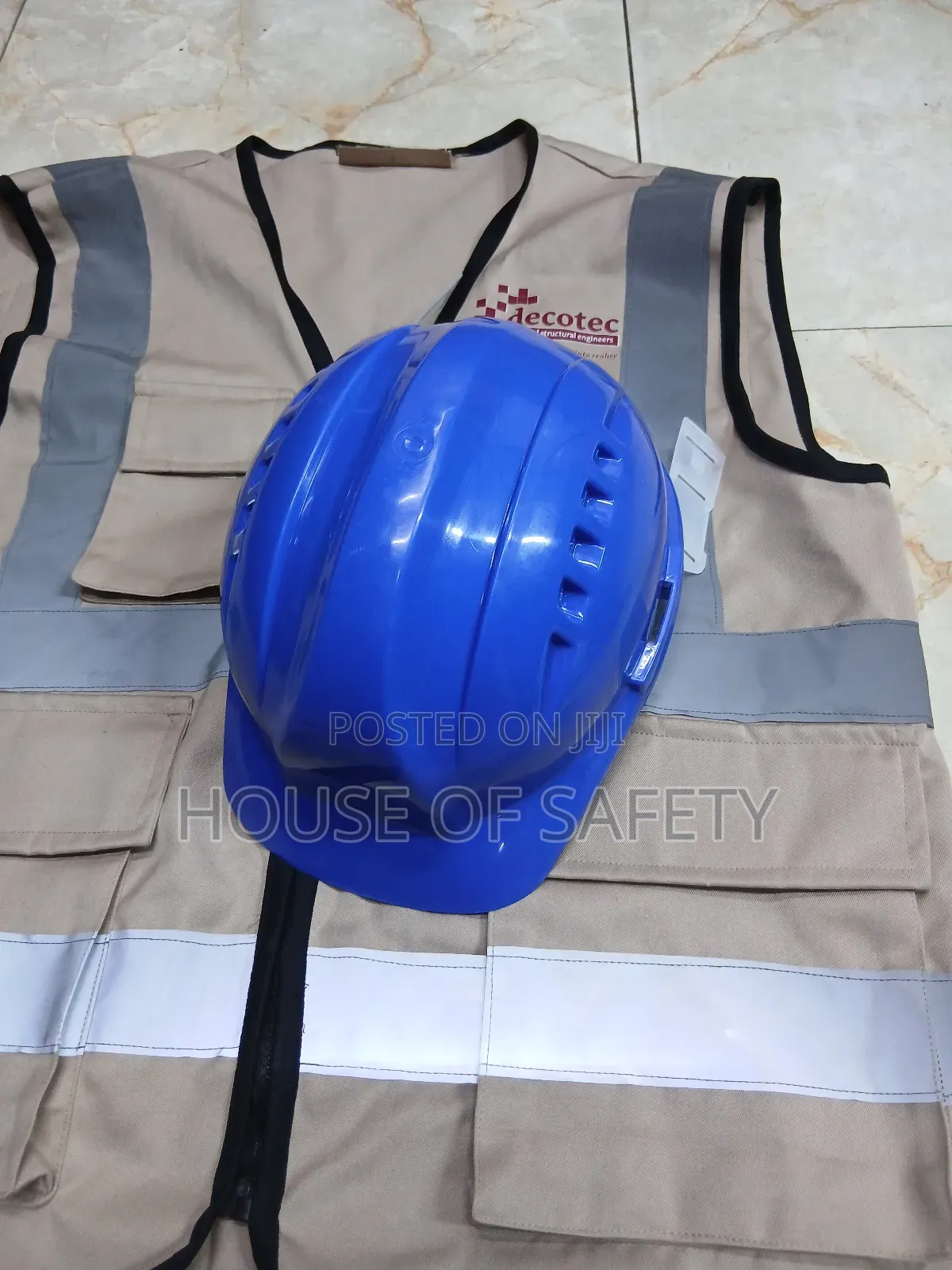 Blue Vaultex Safety Helmet Comes With A Beige Cotton Will Jacket