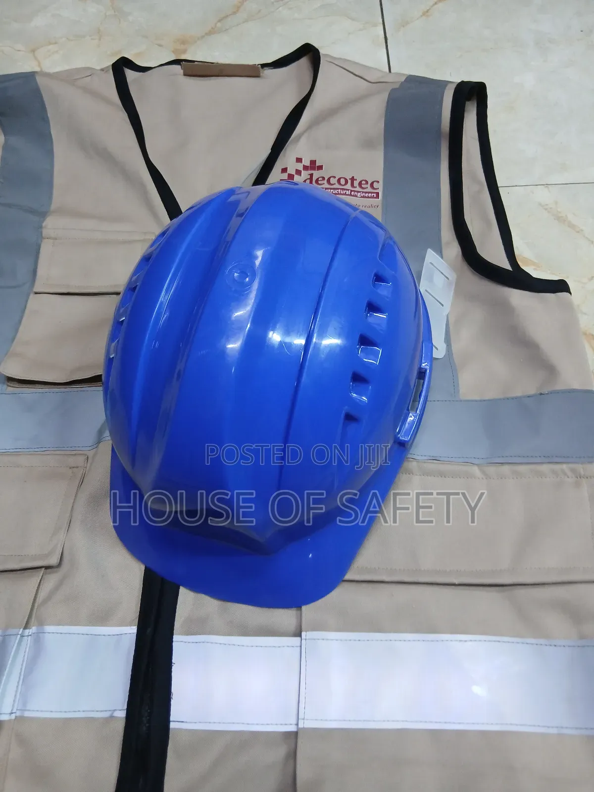 Blue Vaultex Safety Helmet Comes With A Beige Cotton Will Jacket