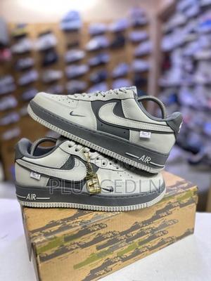 Nike Air Force 1 Low Sneakers in a Grey and Off-White Colorway. - thumbnail 2