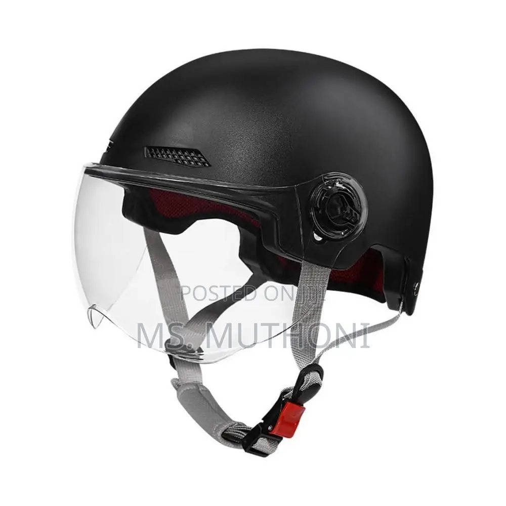 Black Motorcycle Half Helmet With A Clear Visor.