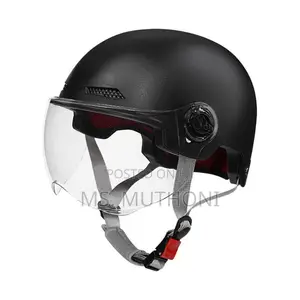 Black Motorcycle Half Helmet With A Clear Visor.