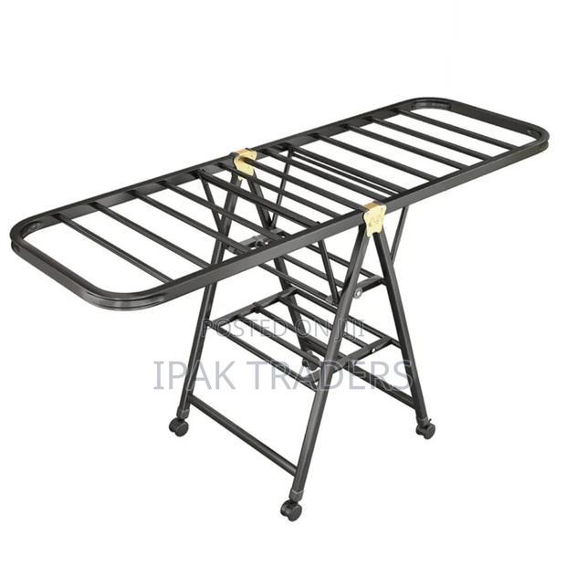 *Folding Clothes Drying Rack*
- *Floor-Standing