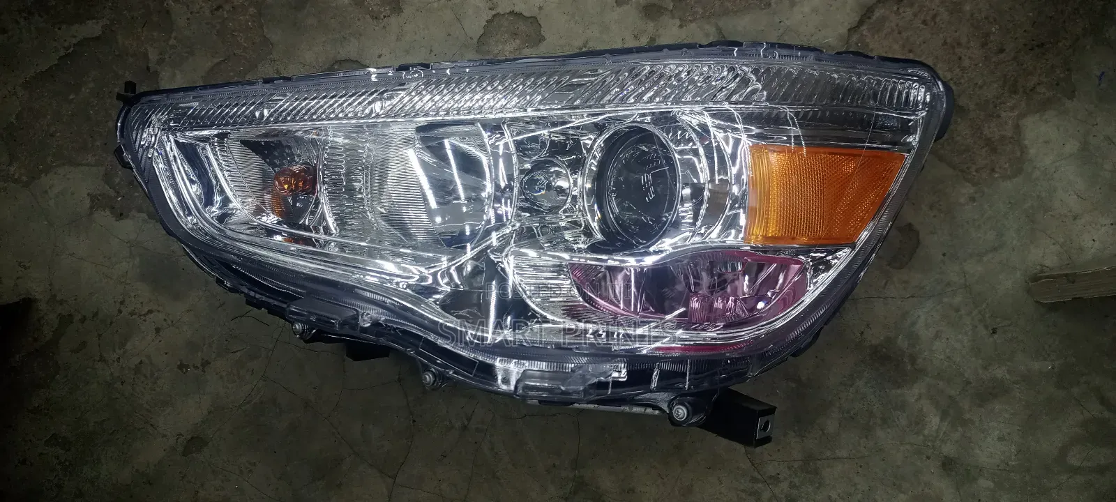 Mitsubishi RVR Headlight