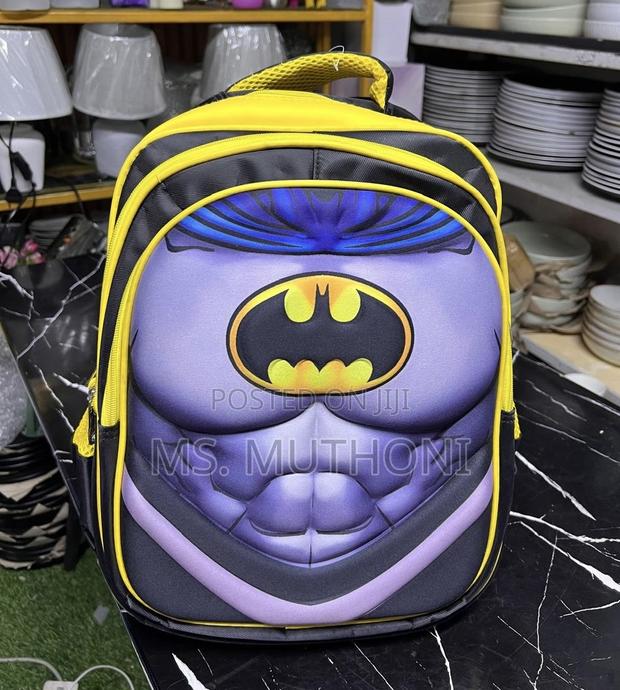 Yellow and Black Batman Character Backpack With a 3d Design