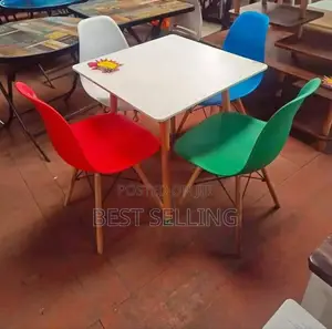 Chairs Each and Eamas Table