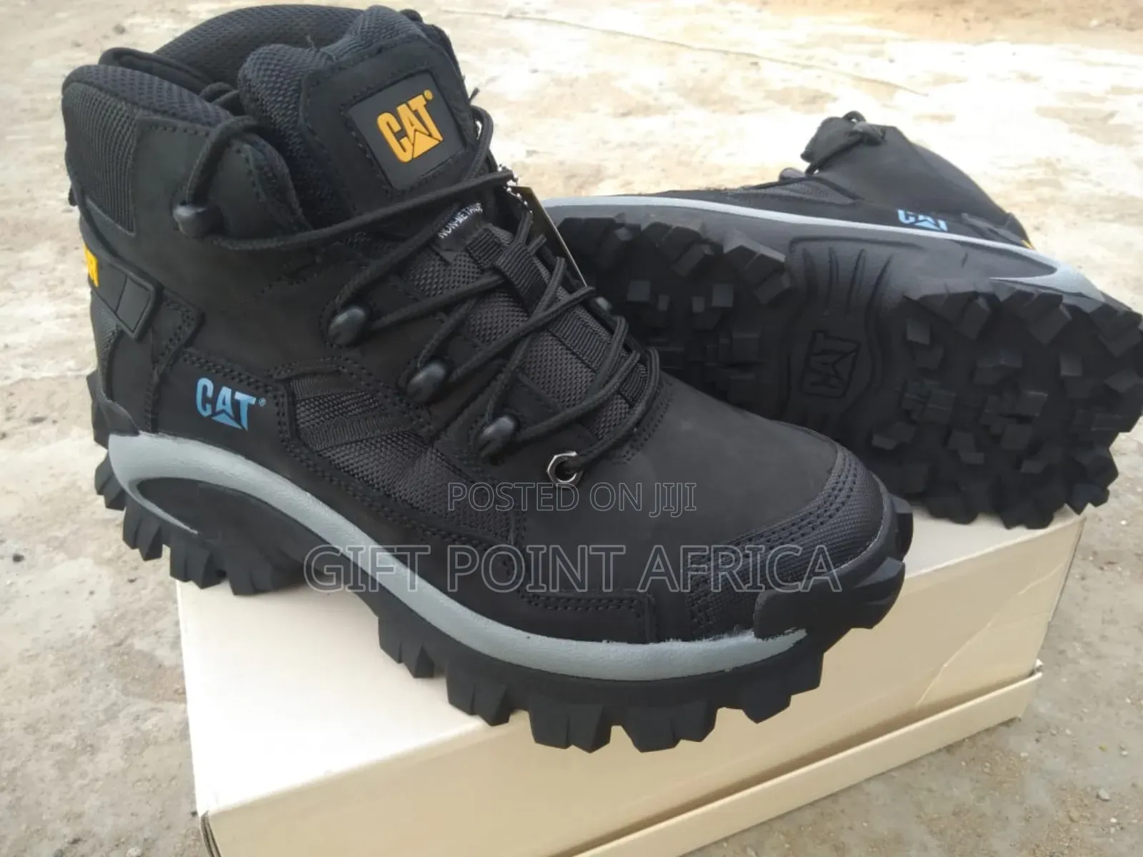 A Brown Caterpillar (Cat) Hiking Or Sports Boots.