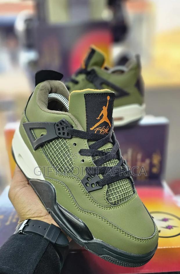 Nike Air Jordan 4 Retro "Craft Olive" Sneakers.