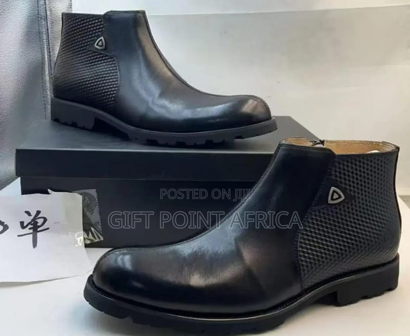 Black Leather Ankle Boots With A Side Zipper