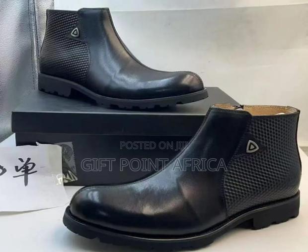 Black Leather Ankle Boots With A Side Zipper - thumbnail 2