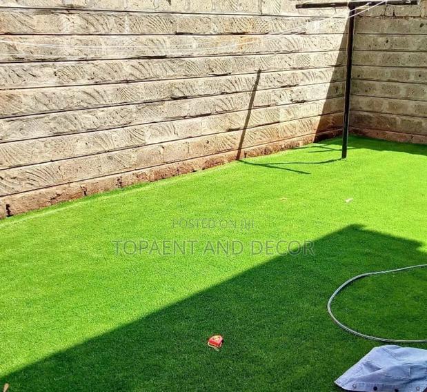 Realistic Artificial Grass Carpet Design for Home Compound - main view