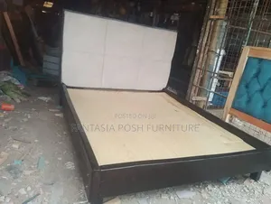 5x6 Dark Wood Bed With Padded Headboard