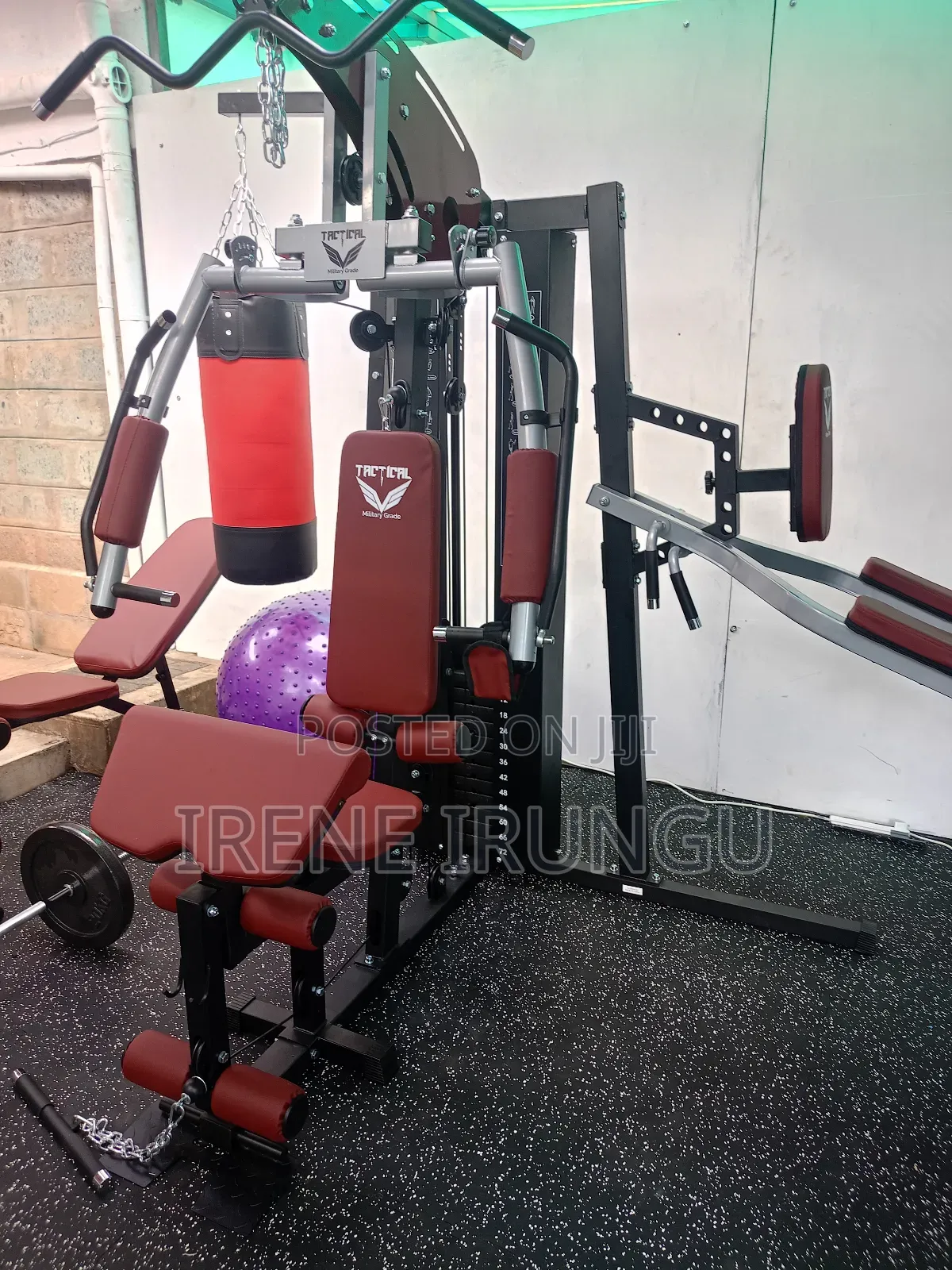 4 Station Multi Gym Machine With a Punching Bag