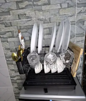 Dish Drying Rack With a Drainboard and Utensil Holder.