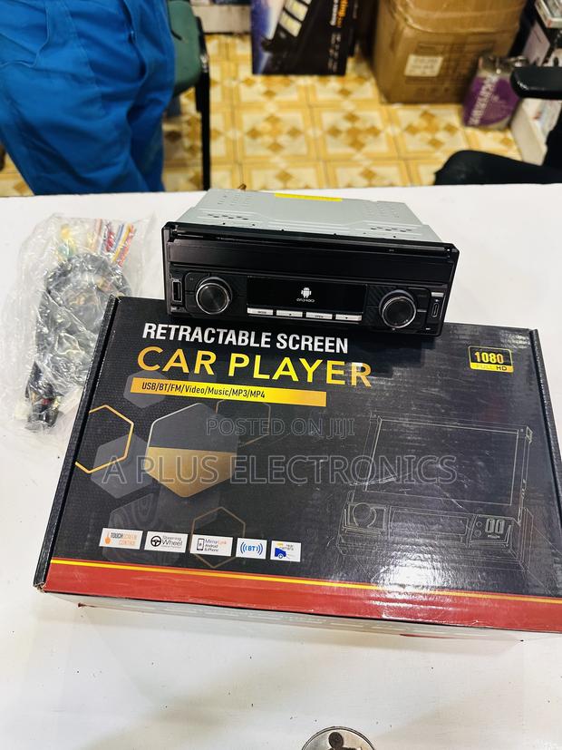 Single-Din Car 7 Inch Media Player With a Retractable Touchscreen. - main view