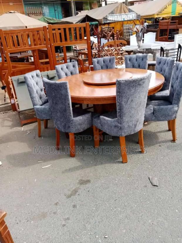Wooden Upholstered 8-Seater Round Dinning Table Set