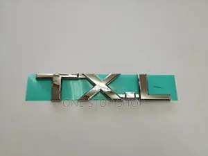 TXL Lettering Badge