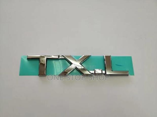 TXL Lettering Badge