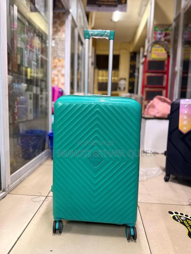 Medium Rubber Suitcase 
Height 66cm - main view