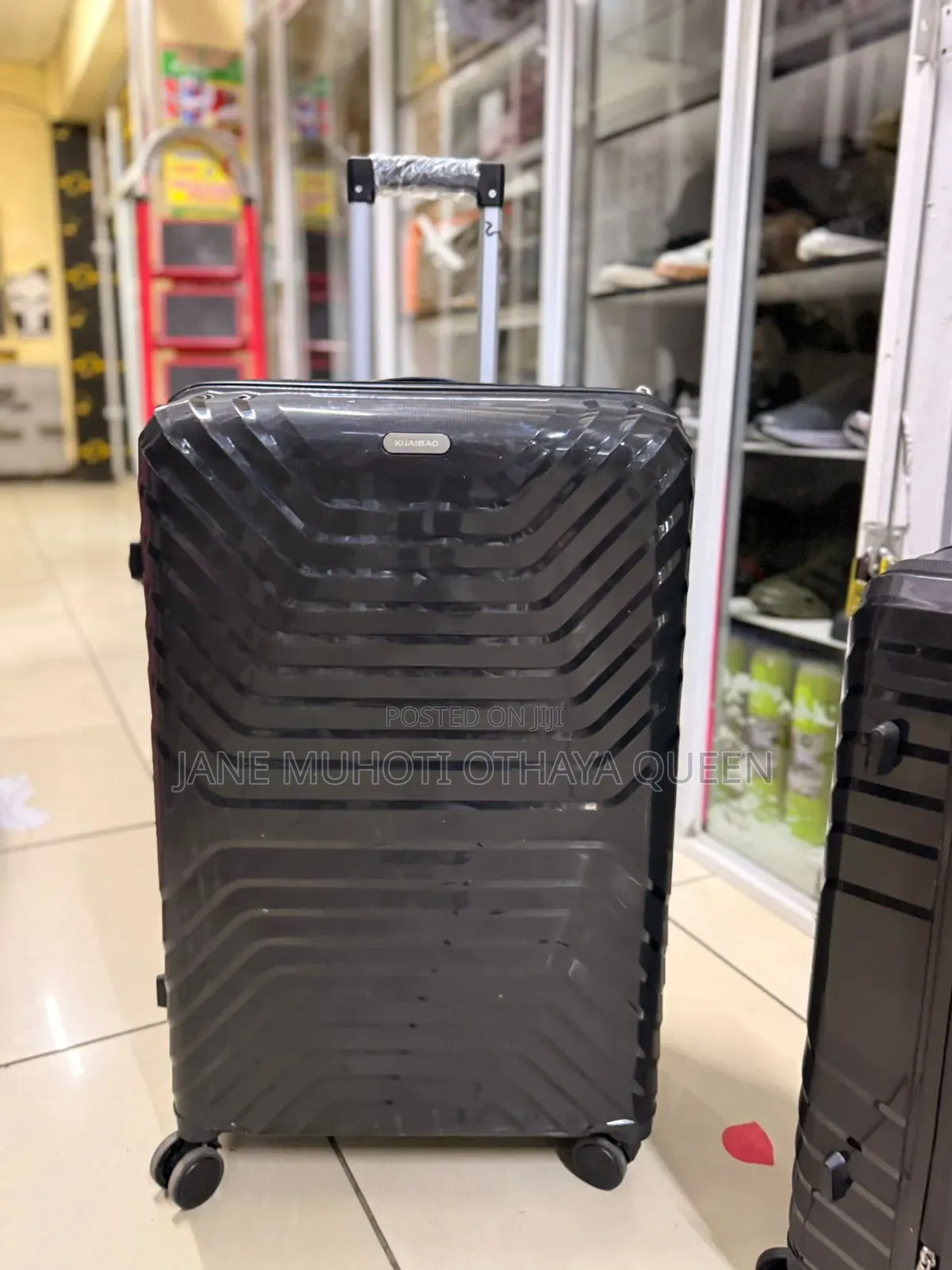 Medium Rubber Suitcase 
Height 66cm