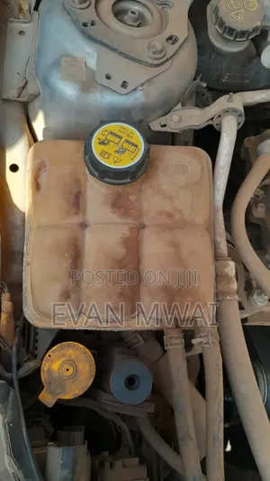 Mazda Axela Radiator Water Bottle