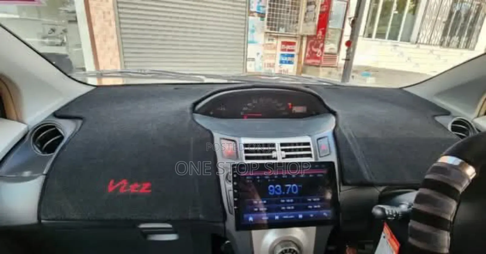 Vitz Car Fitted With Branded Dashboard Cover