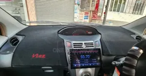 Vitz Car Fitted With Branded Dashboard Cover
