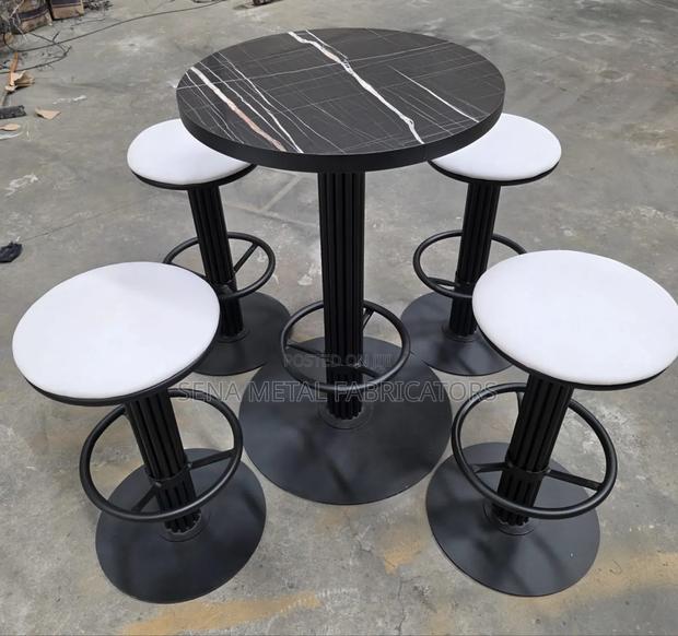 High-Quality White and Black Backless Stools.