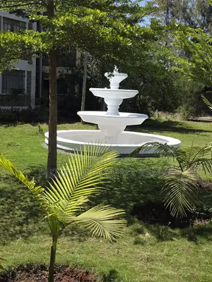 Refined Elegance: Classic White Tiered Water Feature