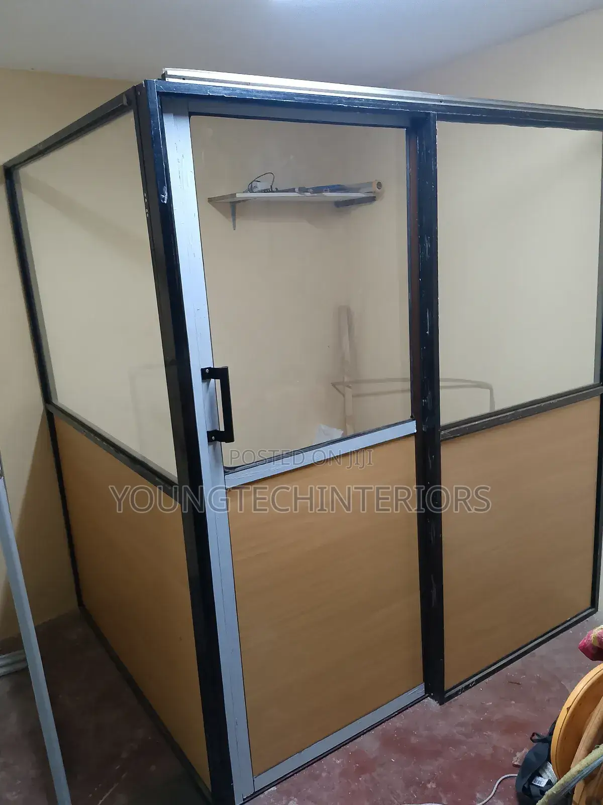 Aluminium, MDF and Glass Partition With a Sliding Door