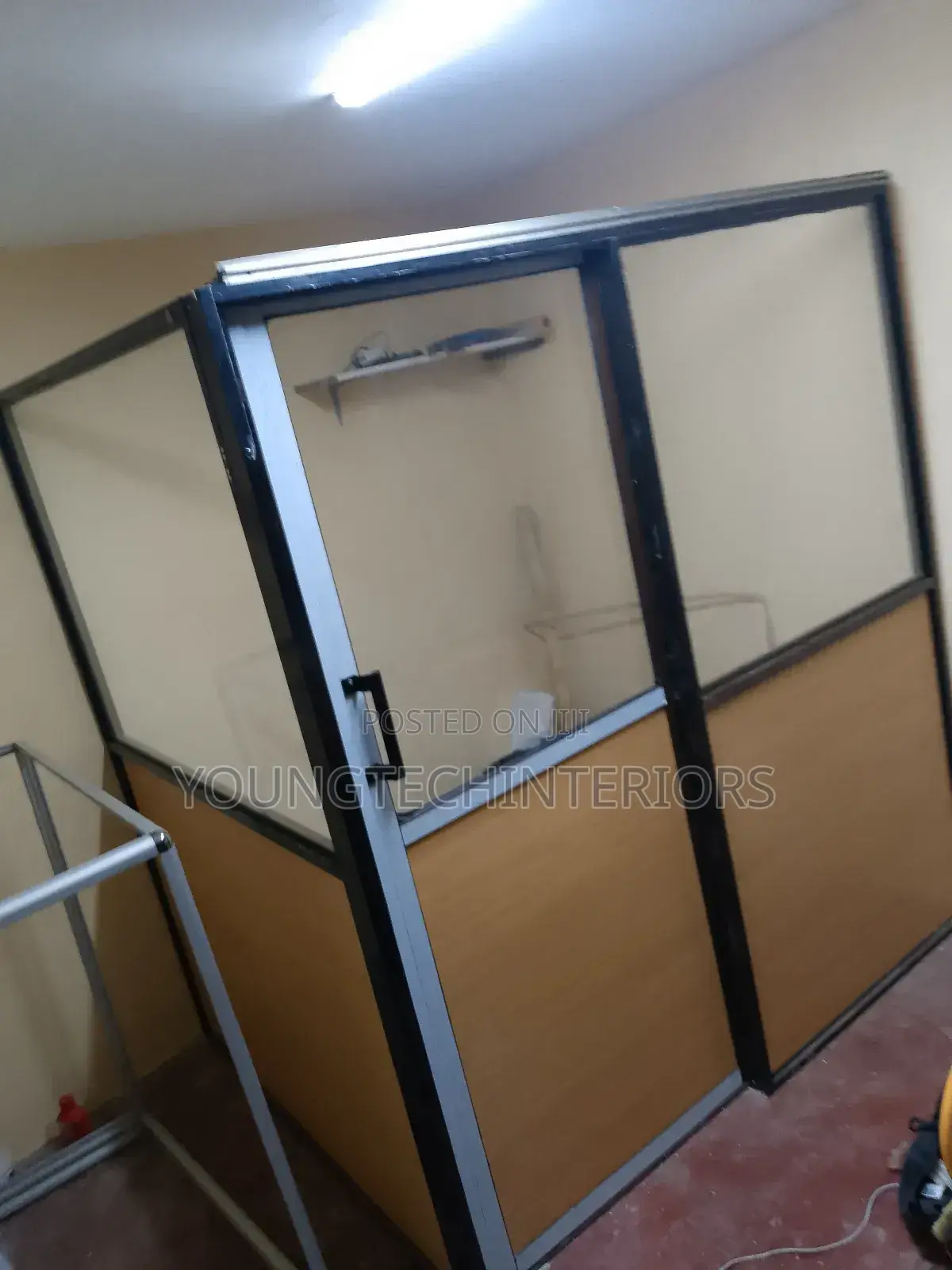 Aluminium, MDF and Glass Partition With a Sliding Door