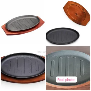Cast Iron Hot Sizzling Plate on Wooden Tray