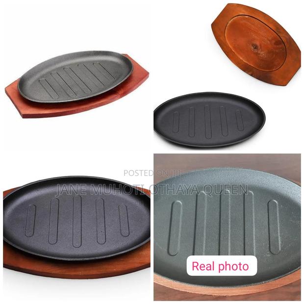 Cast Iron Hot Sizzling Plate on Wooden Tray