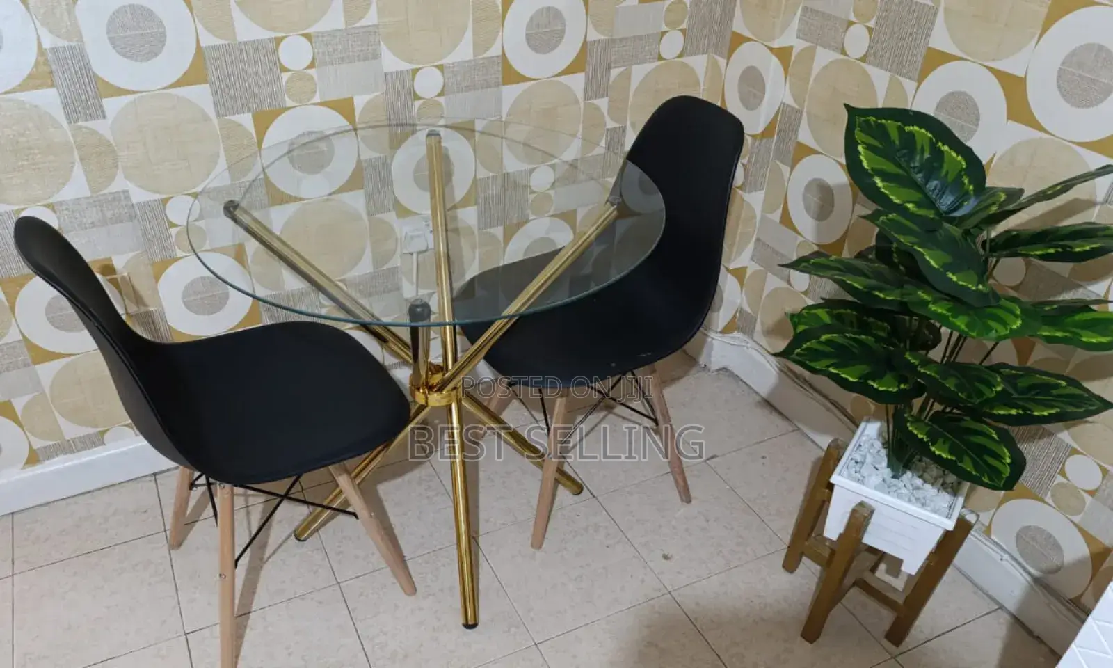 Colorless Top Glass and Black Eames Chair